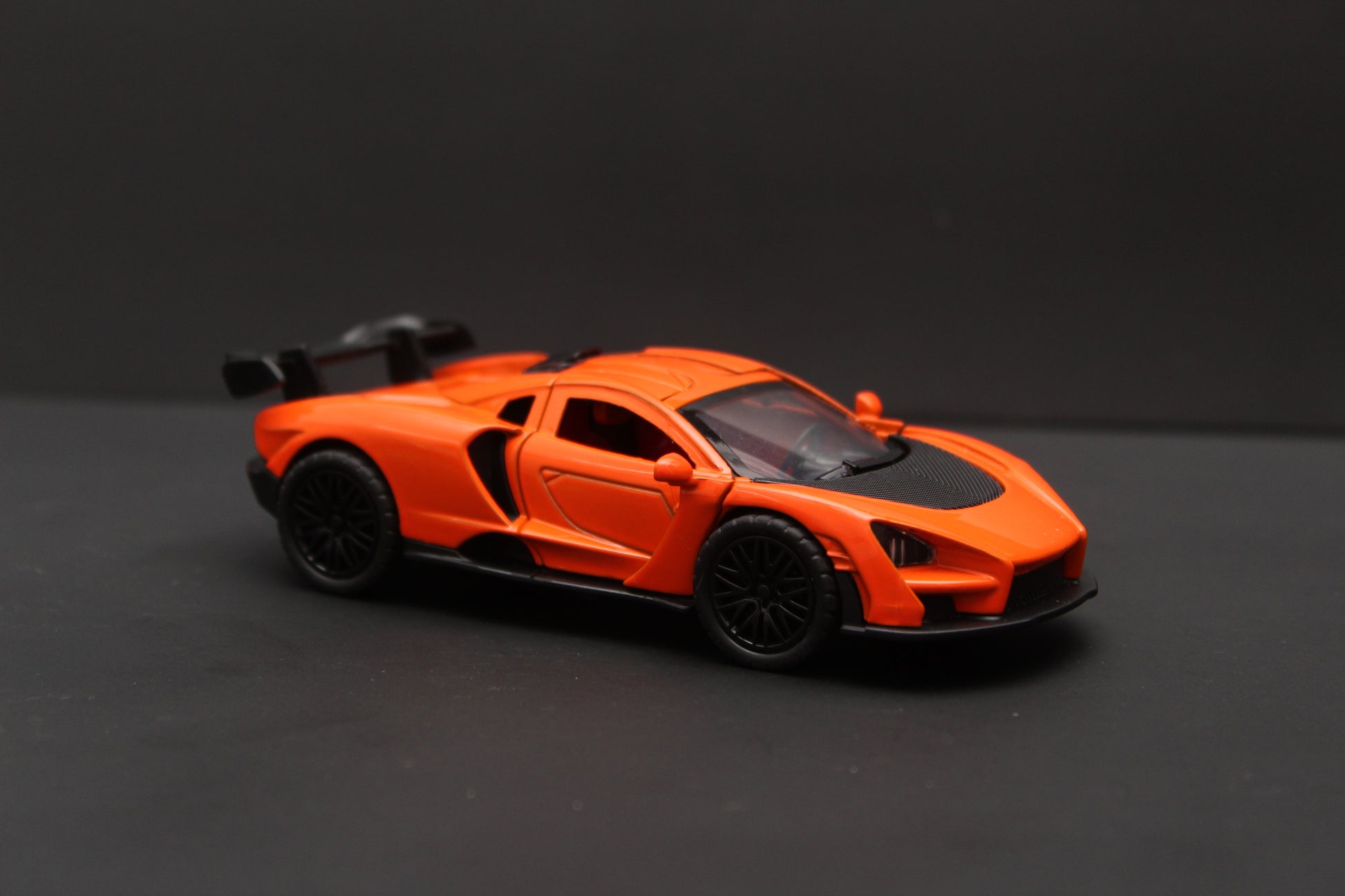 1:36 McLaren Sena Diecast Orange -  Kunju Vandi  