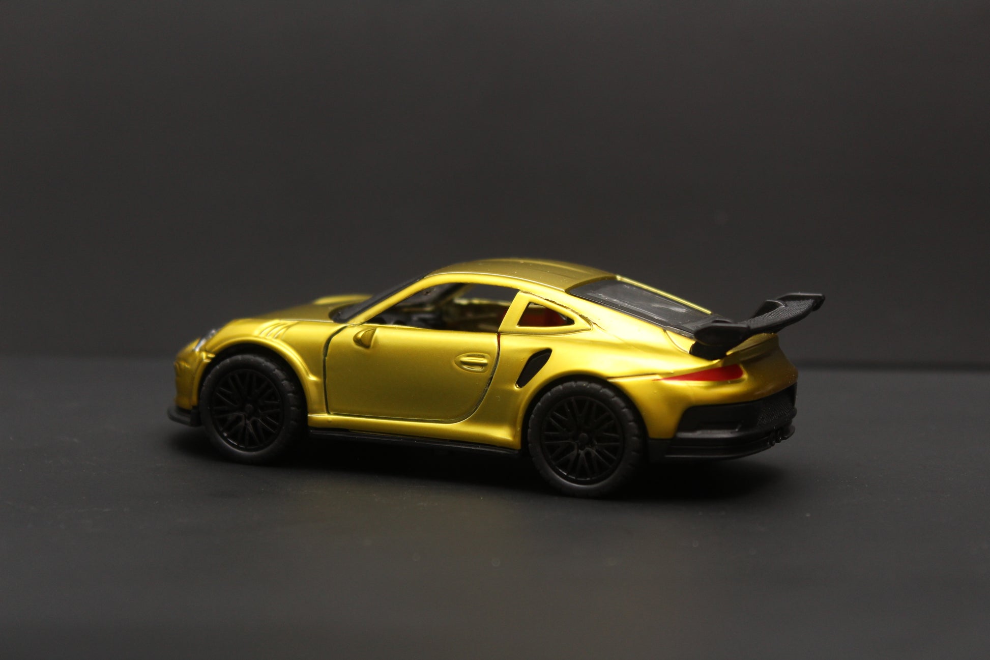 1:36 Porsche Diecast Gold -  Kunju Vandi  