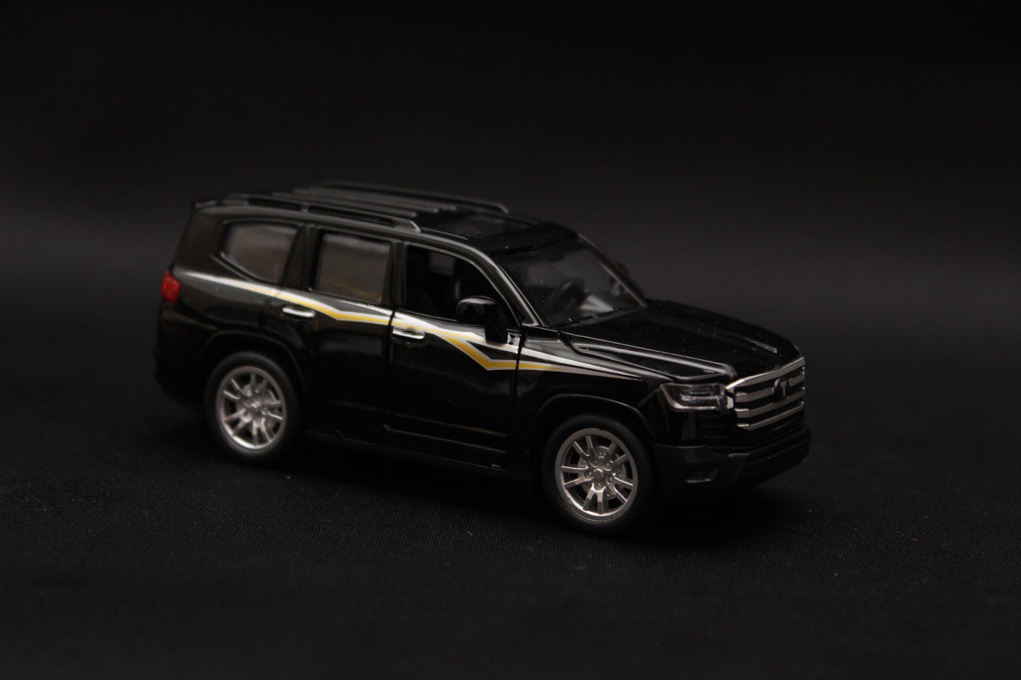 1:36 Toyota land cruiser Diecast Black (Prepaid Only)